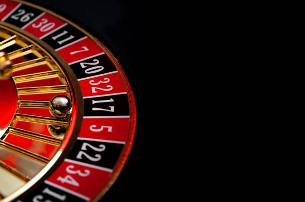 Mobile app showing MotoGP race updates alongside live roulette table