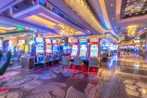 Mobile app interface showing Popular Games feed with live table counts